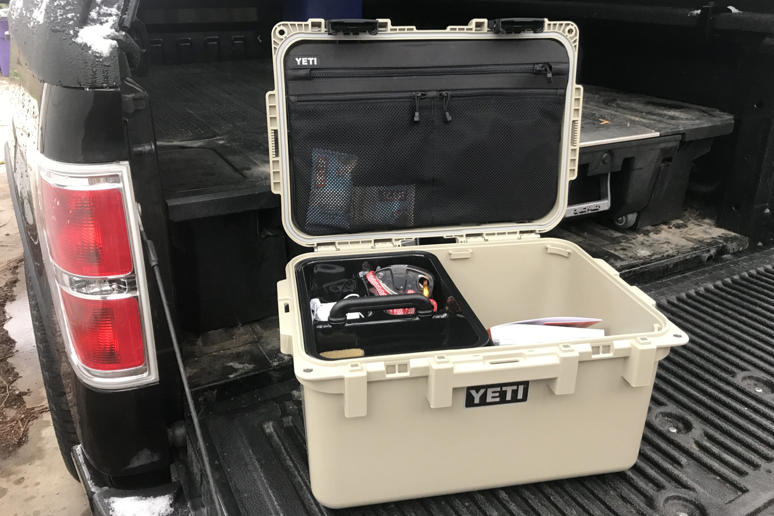 https://watersportswest.com/wp-content/uploads/2021/02/YETI-LoadOut-GoBox-in-truck-scaled.jpg