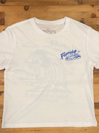 Watersports West x Stoefs Costal Classic Women's Tee. Women's White/ Blue Surf Tee Shirt. Comes in Small, Medium, Large.