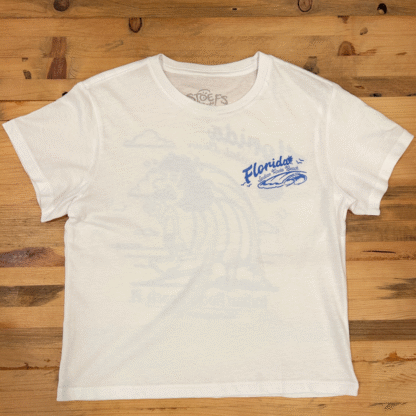 Watersports West x Stoefs Costal Classic Women's Tee. Women's White/ Blue Surf Tee Shirt. Comes in Small, Medium, Large.