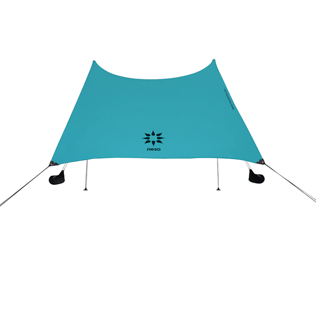 Neso's signature beach tent, anchored with sand or rocks, designed for ultimate ease. Includes - Carrying bag, 2 rust-proof aluminum poles, 4 anchor bags.